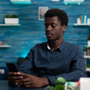 Student browsing on social media, chatting with remote friends