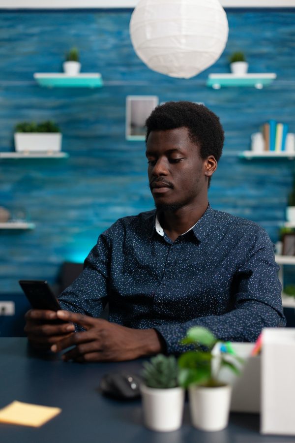 Student browsing on social media, chatting with remote friends